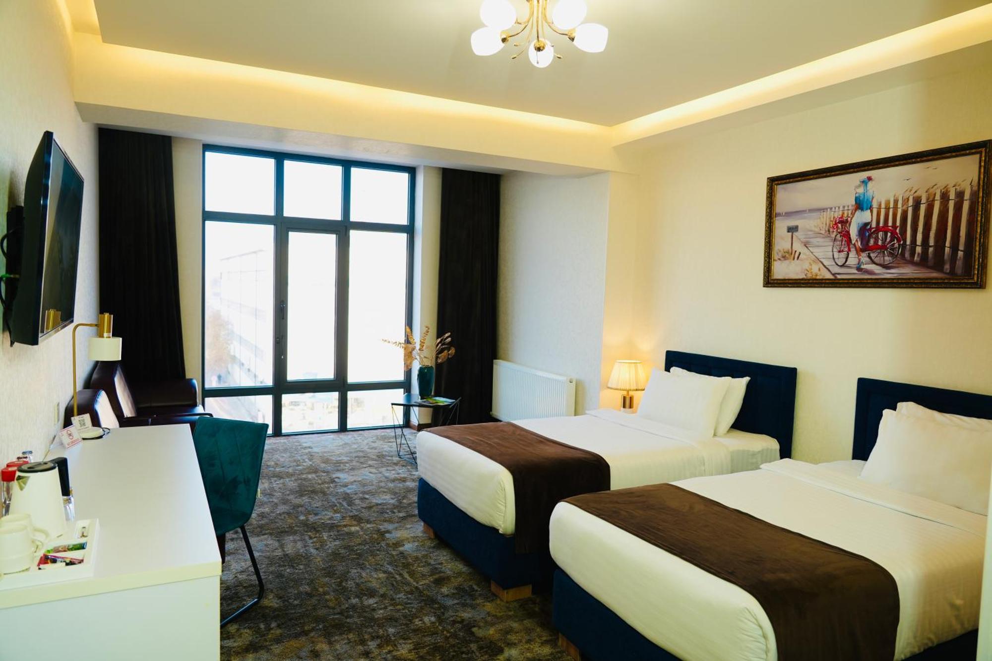 Garnet Mir Hotel Tashkent Esterno foto
