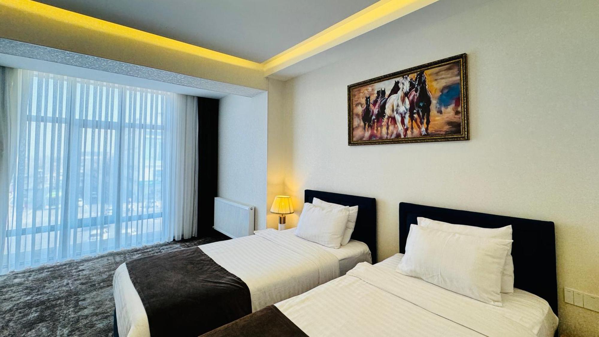 Garnet Mir Hotel Tashkent Esterno foto